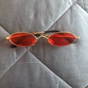 Oval orange glasses